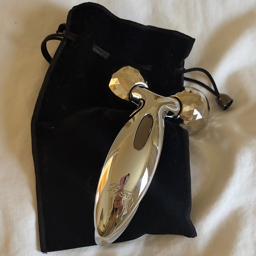 Luxurious Silver Facial Massager by ReFa